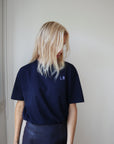 'IT COMES IN WAVES' T-SHIRT IN NIGHT BLUE