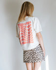 'IT COMES IN WAVES' T-SHIRT IN CREAM NEON