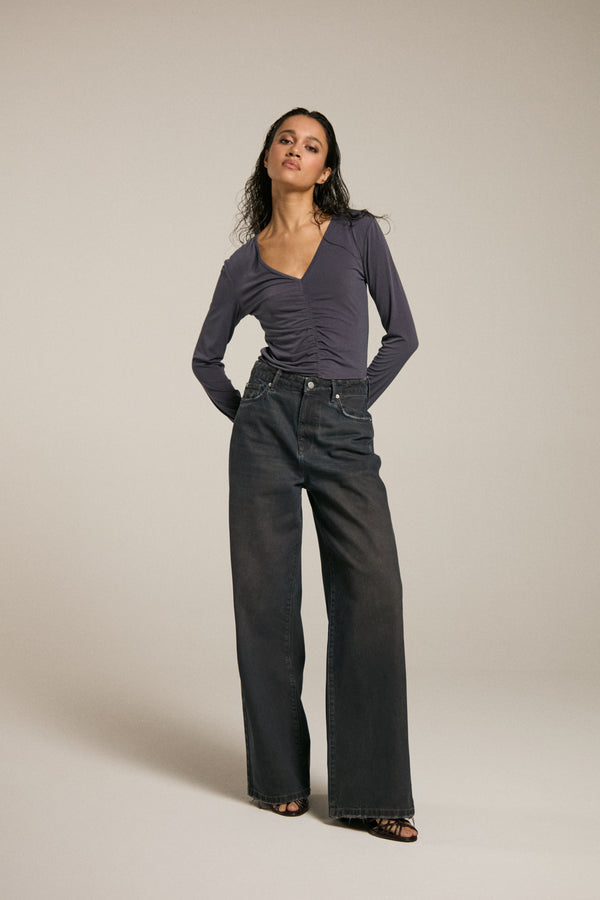 WIDE LEG COATED JEANS