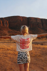 'IT COMES IN WAVES' T-SHIRT IN CREAM NEON