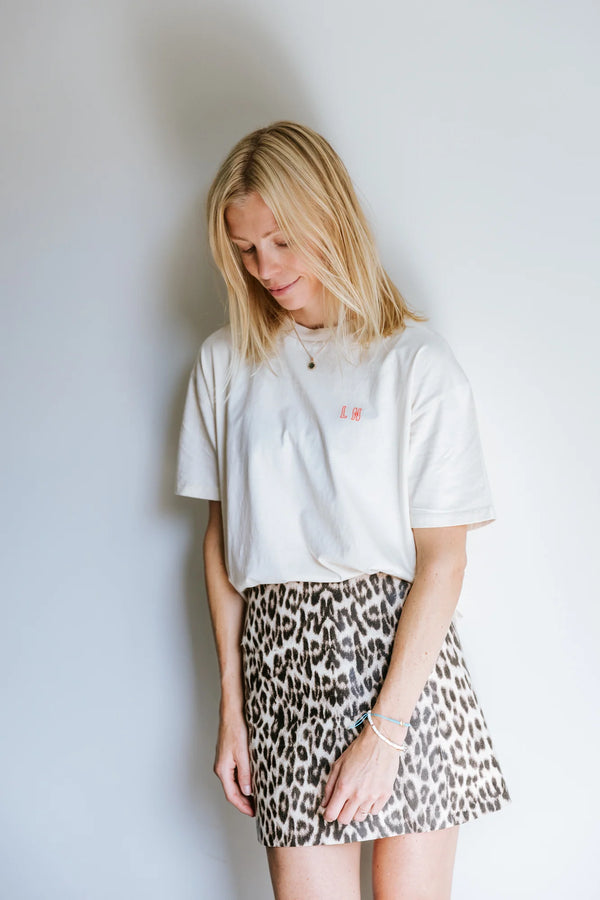 'IT COMES IN WAVES' T-SHIRT IN CREAM NEON
